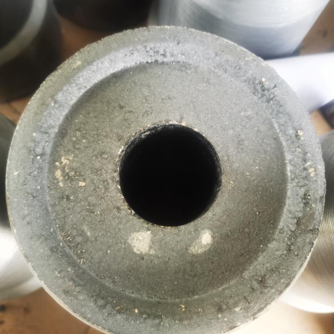 Parte superior de la boca de la cucharón y boca refractarias del colector